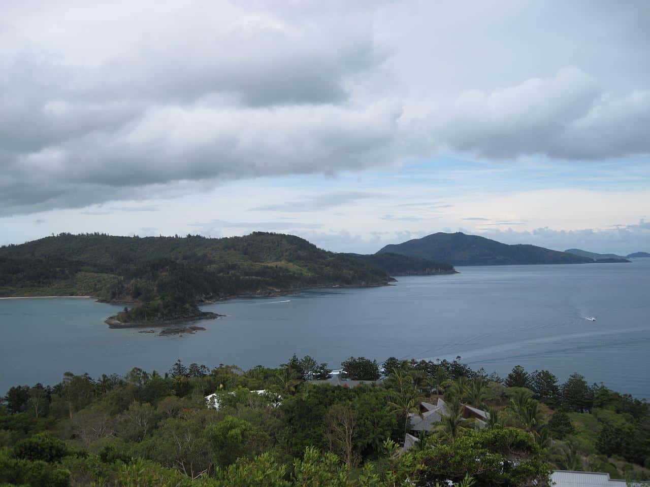 Hamilton Island in the foreground, Whitsunday Island in the background and the small Fitzalan Island between the two