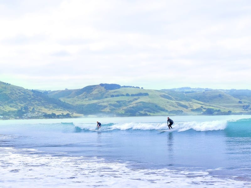 Surfers in Apollo Bay, Australia