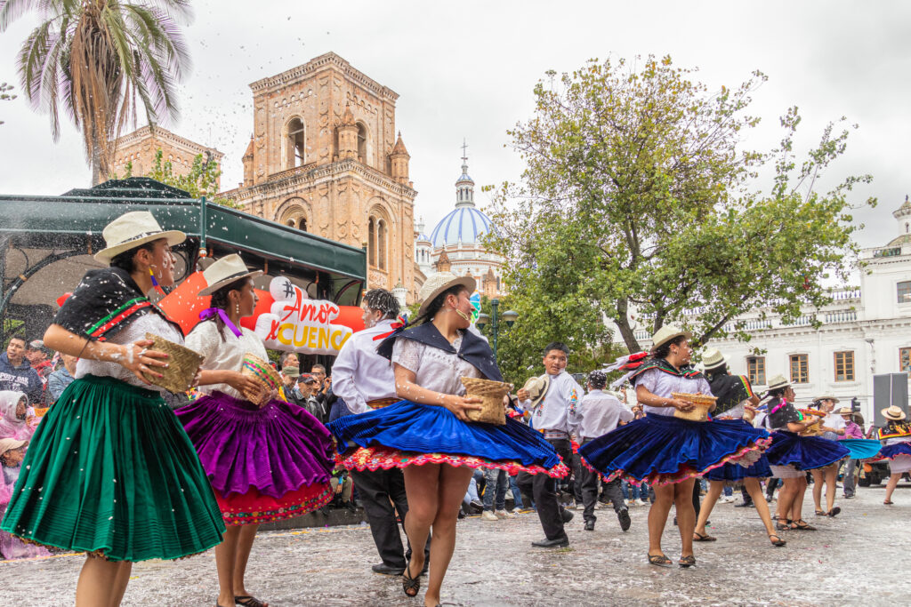 Folk dancers of Azuay on Carnival parade, Ecuador