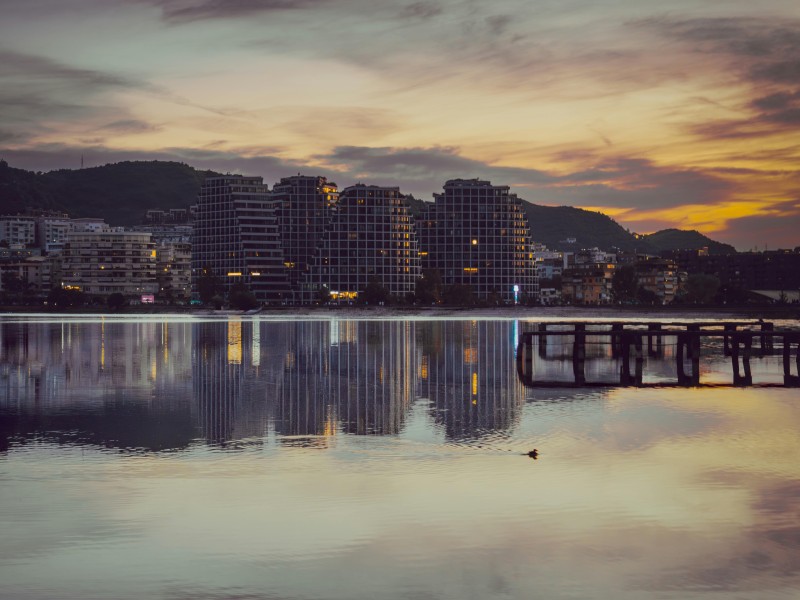 Beautiful sunset over Tirana skyline wit